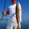 John with a nice Sarasota bay Redfish 4 / 2011'