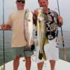 Tony and Tommy enjoying a hot Snook and Redfish bite in Sarasota Bay 8/2009'